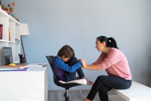 Mother taking care her child, representing Children & Adolescent Psychiatrist Services