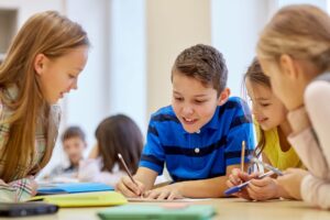 Children studying in school, highlighting Schools Supporting Students with Mental Health Issues