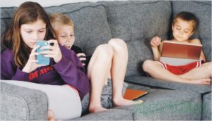 Children playing with gadgets - Negative Effects on Children's Mental Health