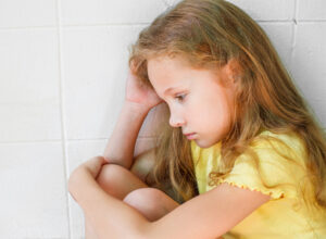 Child experiencing traumatic stress - seeking support and healing