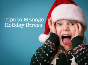 Child wearing Santa Claus hat, symbolizing strategies for helping children cope with holiday stress.